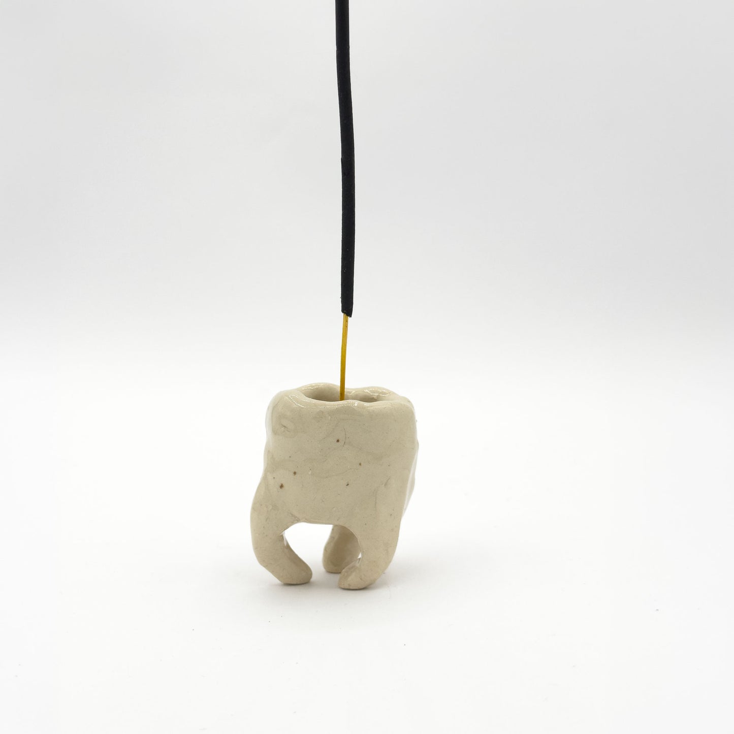 Tooth portaincenso