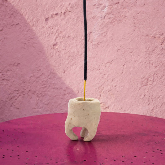 Tooth portaincenso